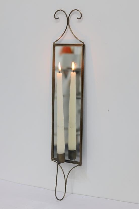 Mirrored wall candle sconces